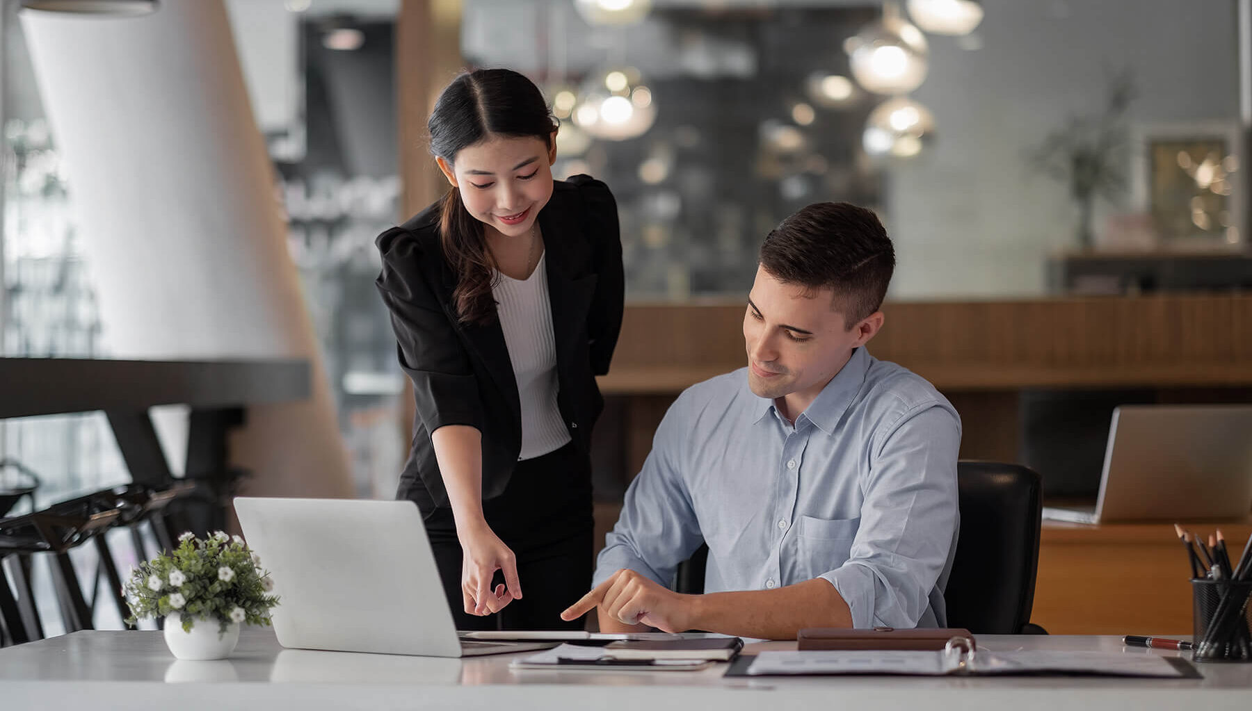 Public Adjusters Working Together On An Insurance Claim